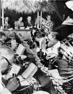 The contestants seated in Garden with Bob Van Dorpe top right.