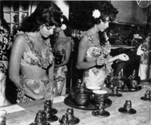 Molokai Girls Jean Goodson, left, and Barbara Taylor prepare the drinks.